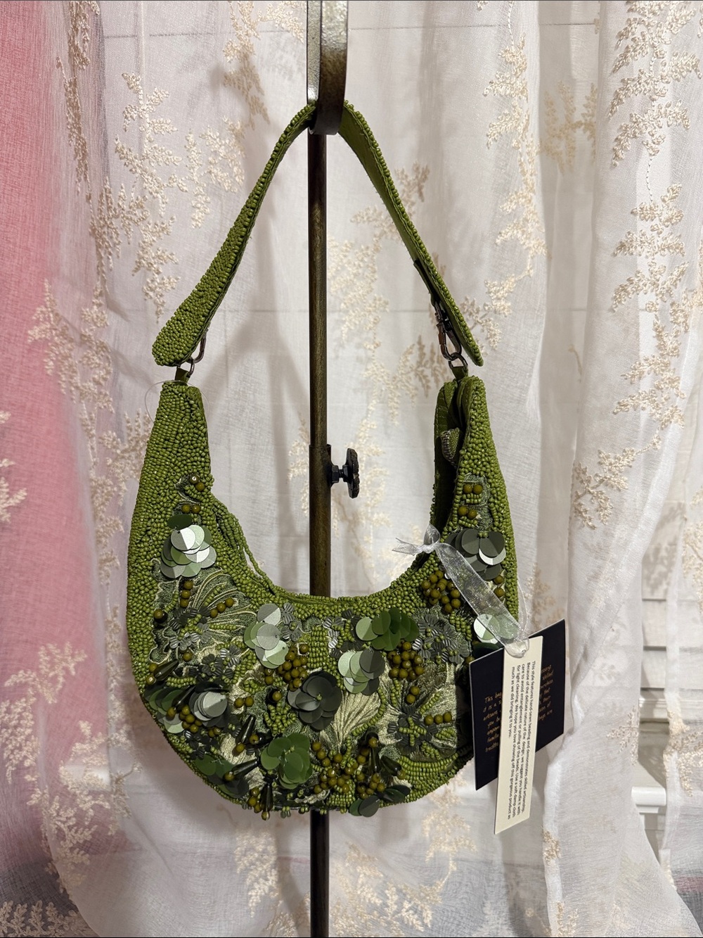 From India to you pea green embroidered and beaded half moon shoulder bag